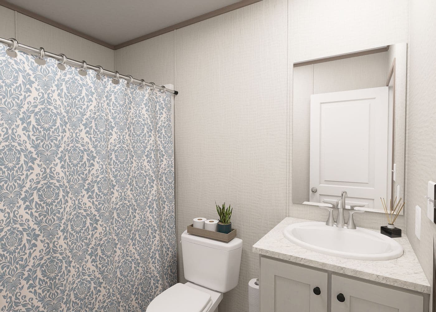 The FLEX COASTAL BREEZE Guest Bathroom. This Manufactured Mobile Home features 3 bedrooms and 2 baths.