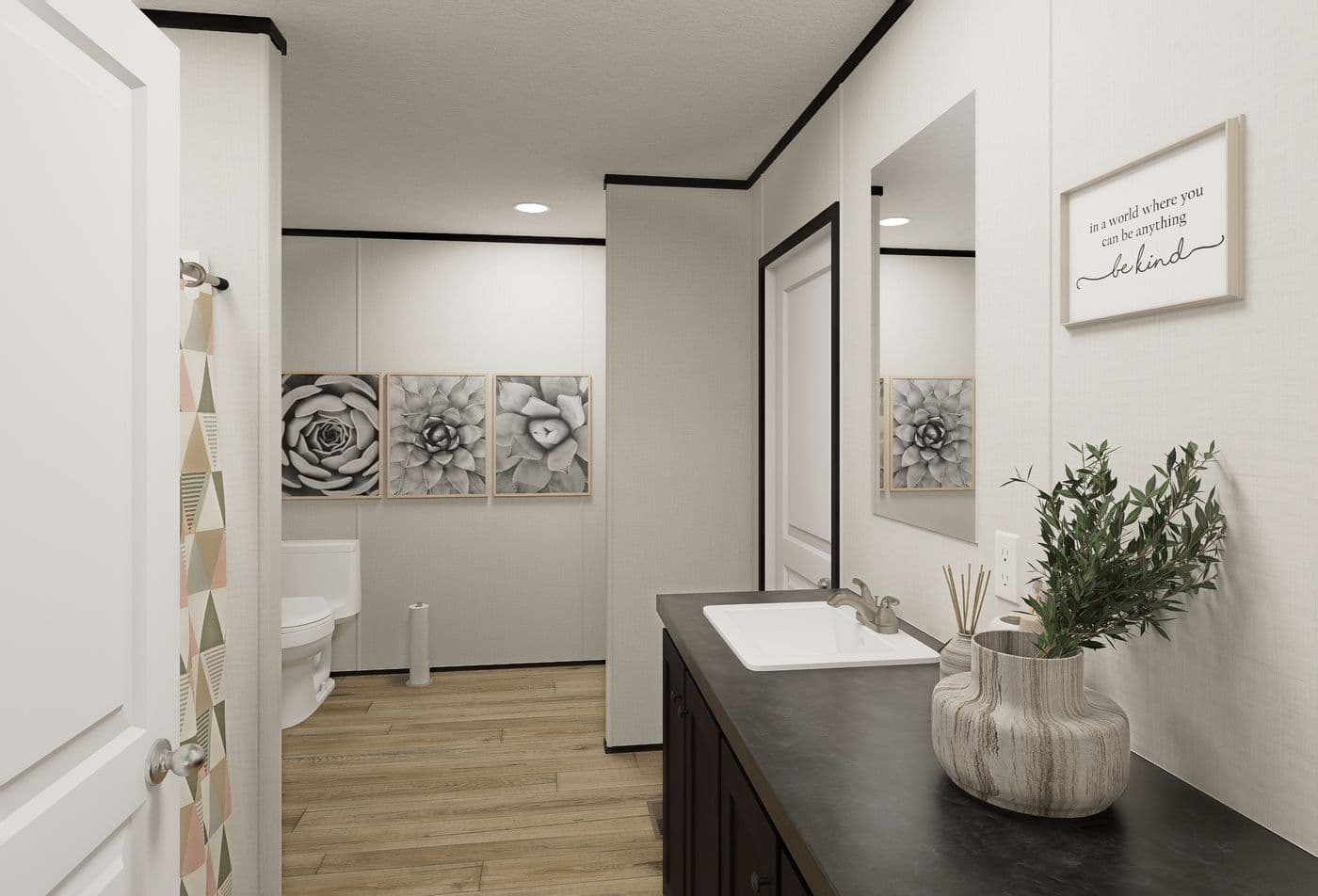 The ECLIPSE Primary Bathroom. This Manufactured Mobile Home features 4 bedrooms and 2 baths.