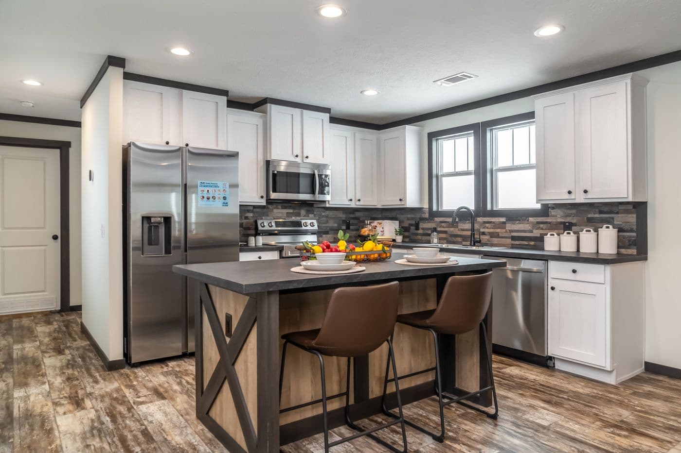 The BABY BOUJEE Kitchen. This Manufactured Mobile Home features 3 bedrooms and 2 baths.