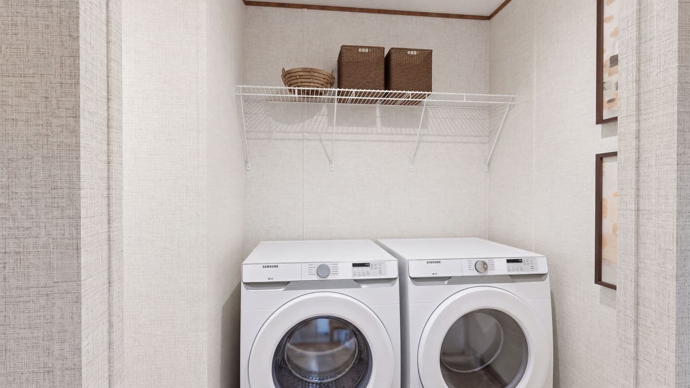 The SPRUCE Utility Room. This Manufactured Mobile Home features 3 bedrooms and 2 baths.