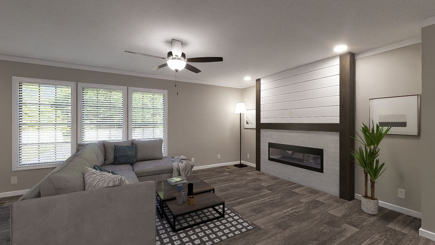 The THE LIL' EASY Living Room. This Manufactured Mobile Home features 3 bedrooms and 2 baths.