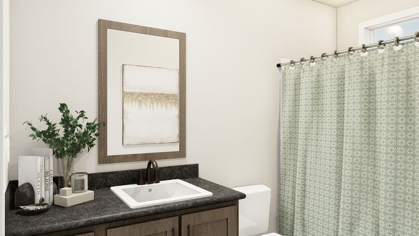 The ING521F NOBLE               GW Guest Bathroom. This Manufactured Mobile Home features 3 bedrooms and 2 baths.