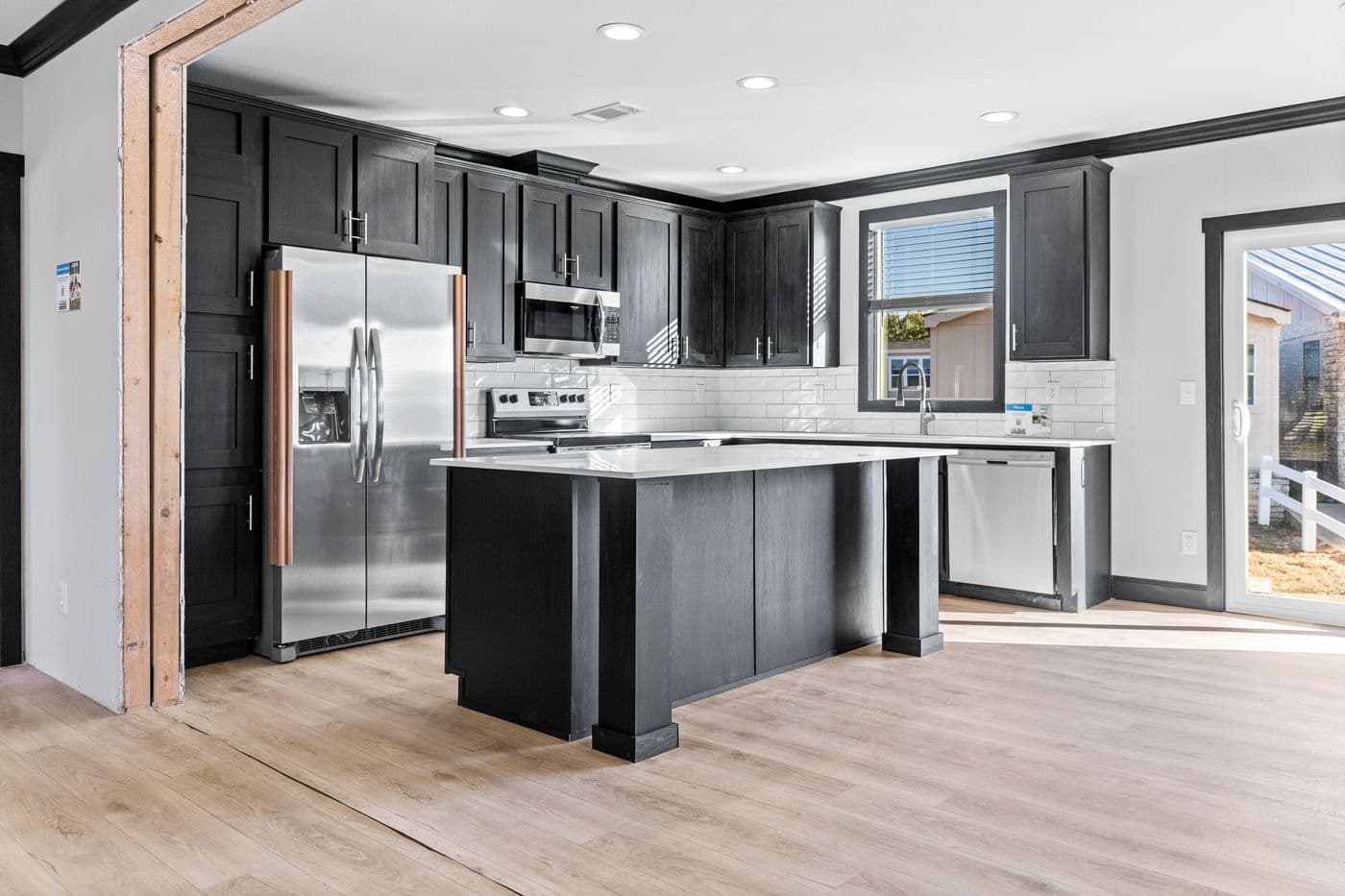 The THE SIERRA Kitchen. This Manufactured Mobile Home features 4 bedrooms and 2 baths.