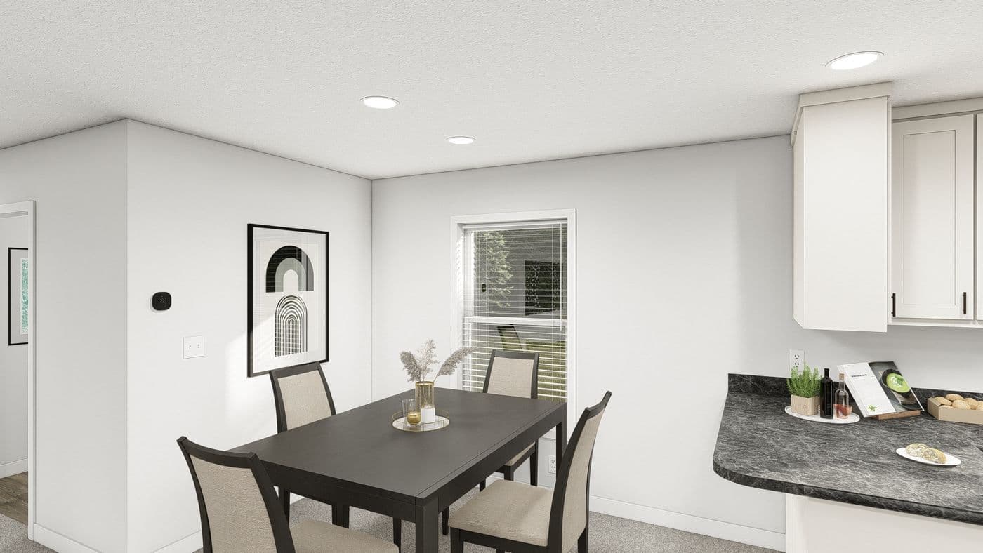 The DRM482P 2048'            DREAM Dining Area. This Manufactured Mobile Home features 2 bedrooms and 2 baths.
