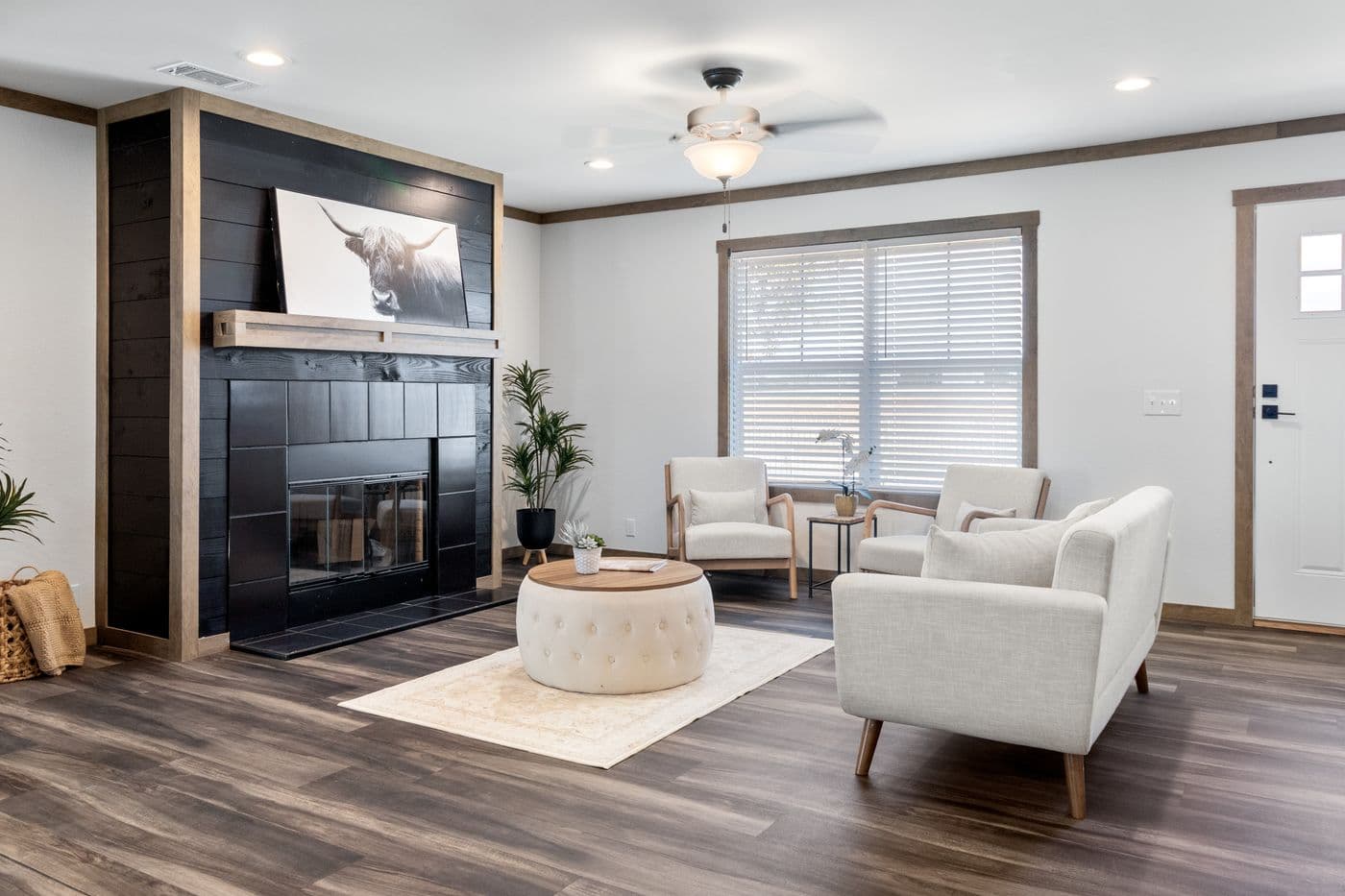 The ISABELLA ELITE Living Room. This Manufactured Mobile Home features 3 bedrooms and 2 baths.