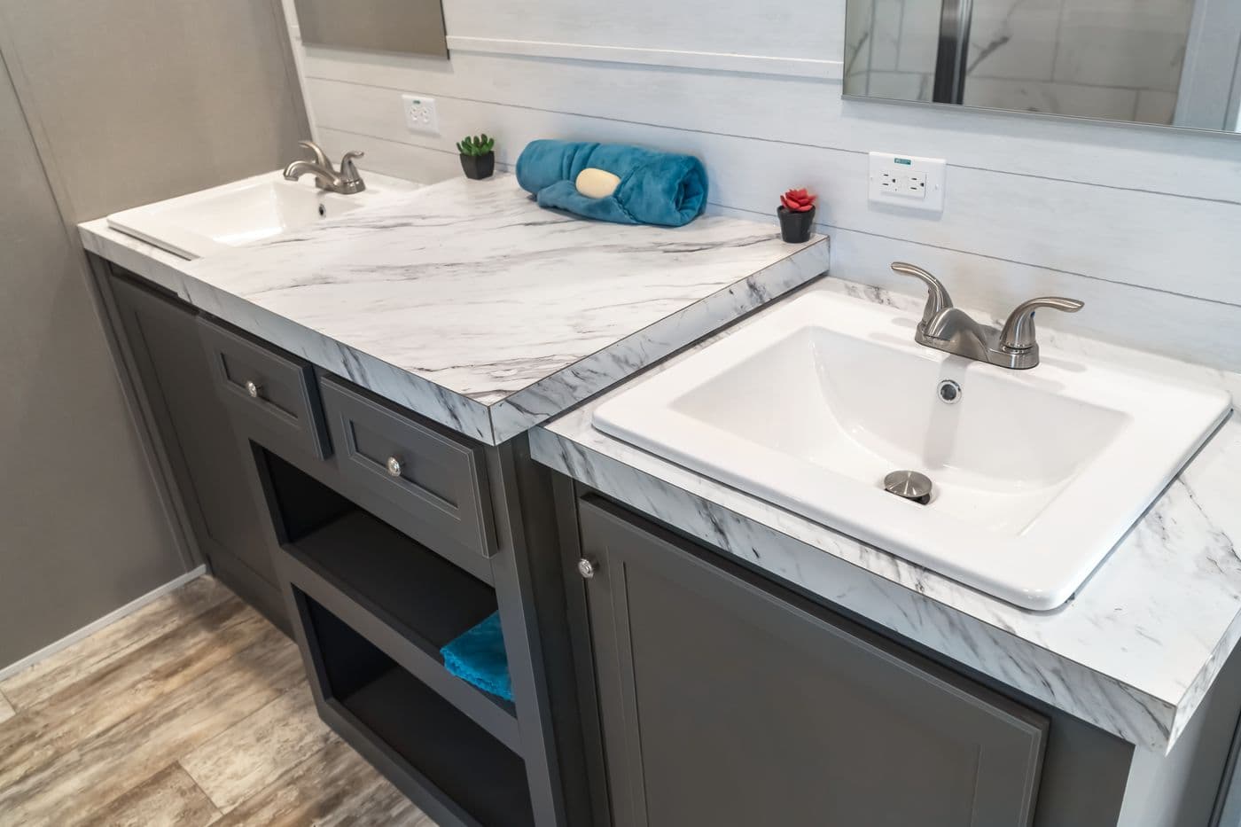 The MAJOR Primary Bathroom. This Manufactured Mobile Home features 3 bedrooms and 2 baths.