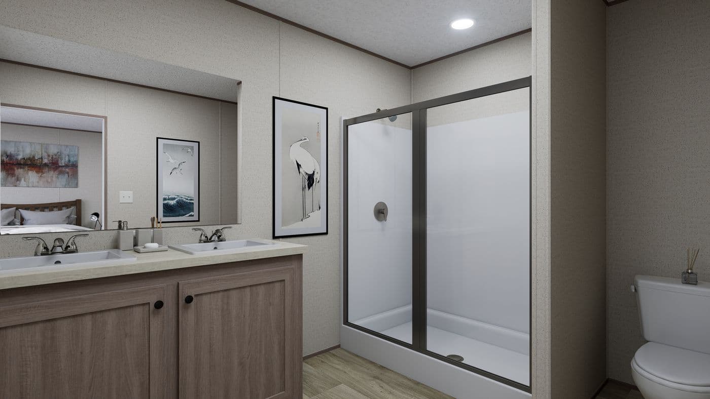 The FOOTHILLS 76 Primary Bathroom. This Manufactured Mobile Home features 3 bedrooms and 2 baths.