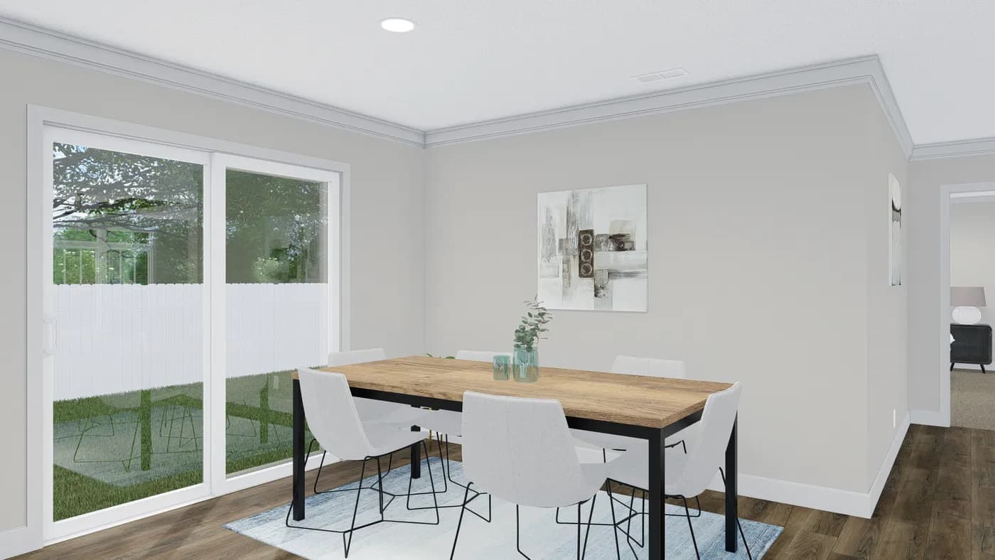 The THE MONTERREY Dining Area. This Manufactured Mobile Home features 4 bedrooms and 3 baths.