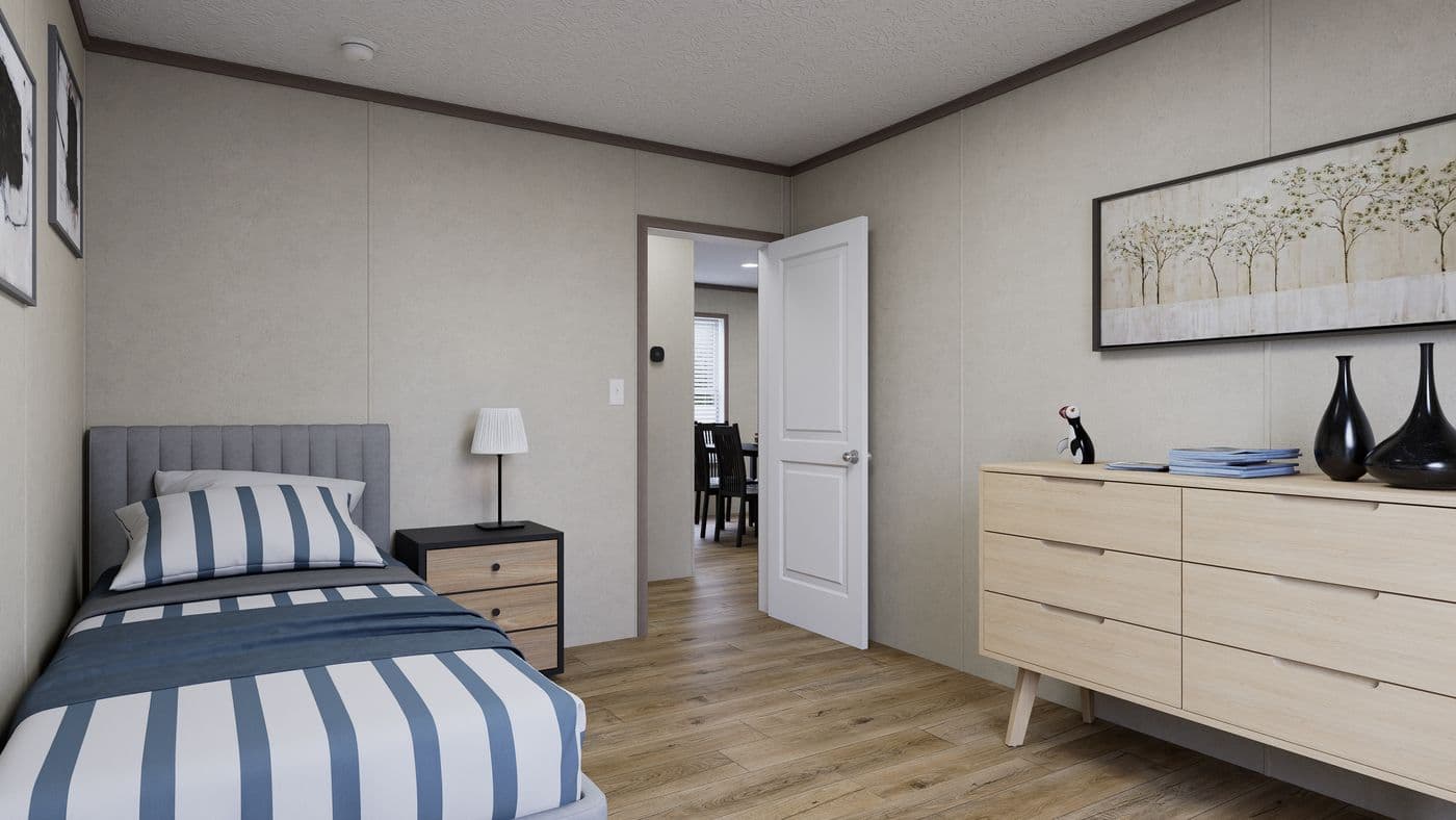 The 5228-CC51 PILLAR 52 Guest Bedroom. This Manufactured Mobile Home features 3 bedrooms and 2 baths.