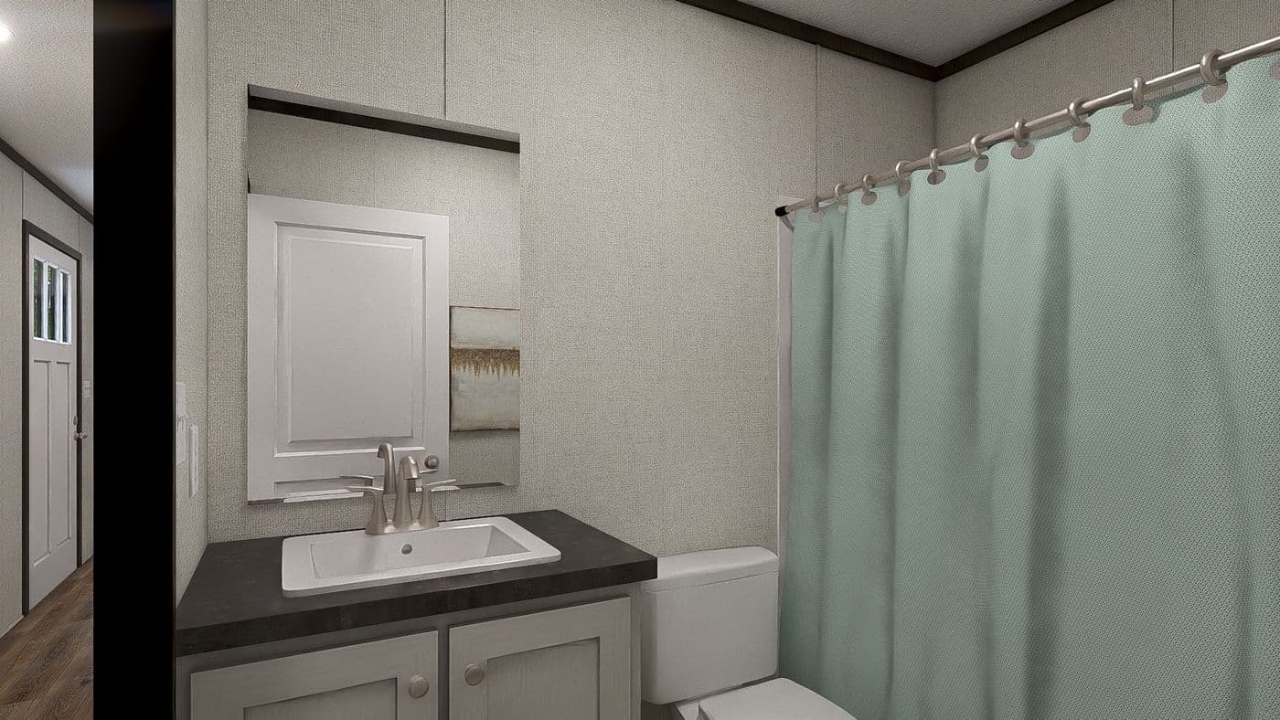 The ESSENCE Guest Bathroom. This Manufactured Mobile Home features 3 bedrooms and 2 baths.