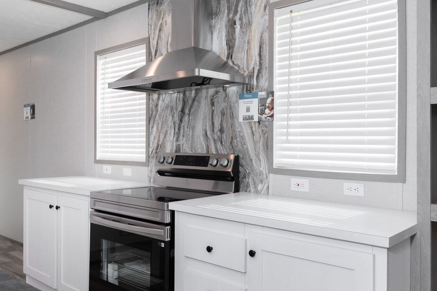 The PLATINUM ANNIVERSARY Kitchen. This Manufactured Mobile Home features 3 bedrooms and 2 baths.