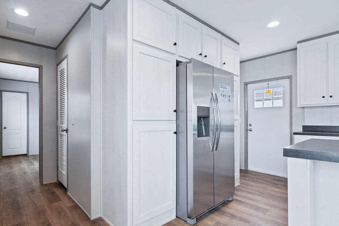 The RESOLUTION 16682X Kitchen. This Manufactured Mobile Home features 2 bedrooms and 2 baths.