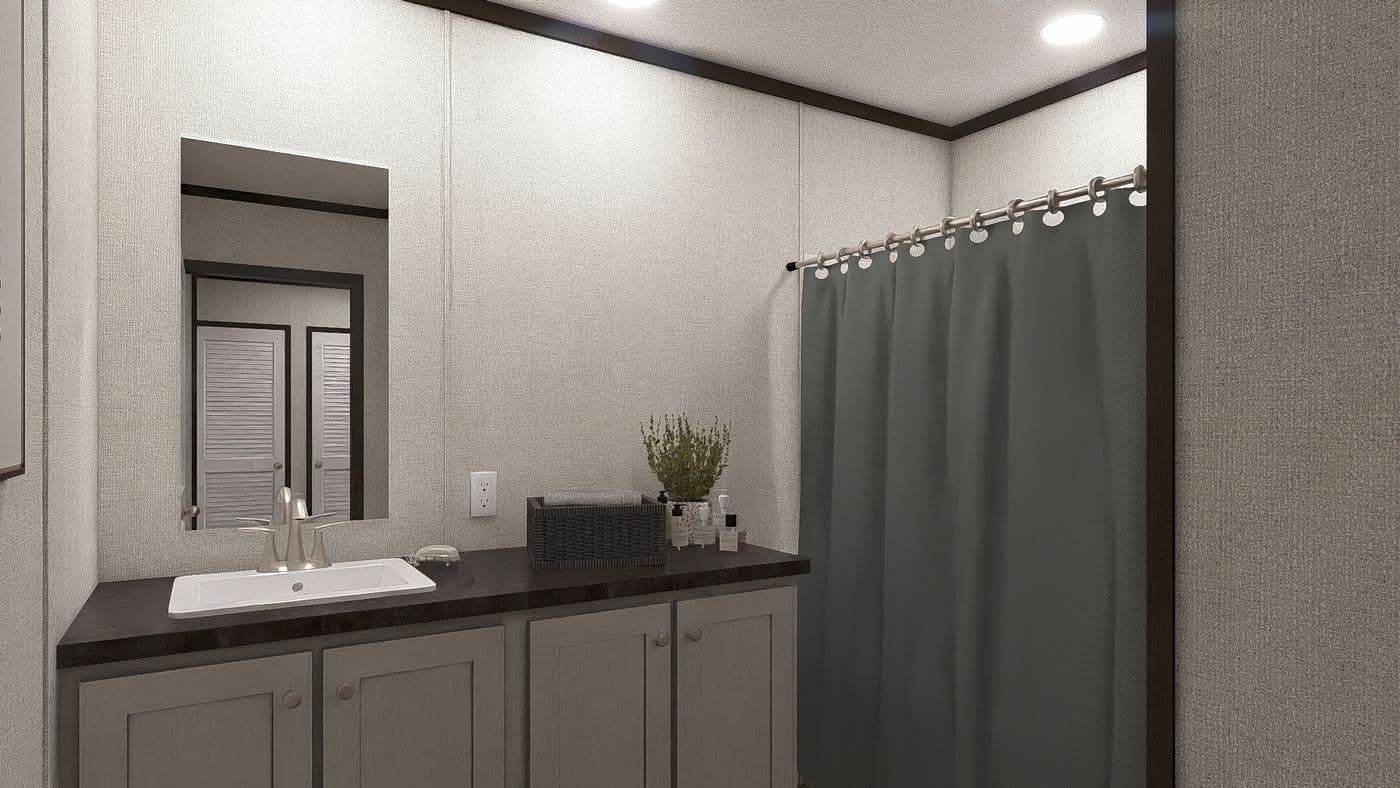 The IMPACT Guest Bathroom. This Manufactured Mobile Home features 4 bedrooms and 2 baths.