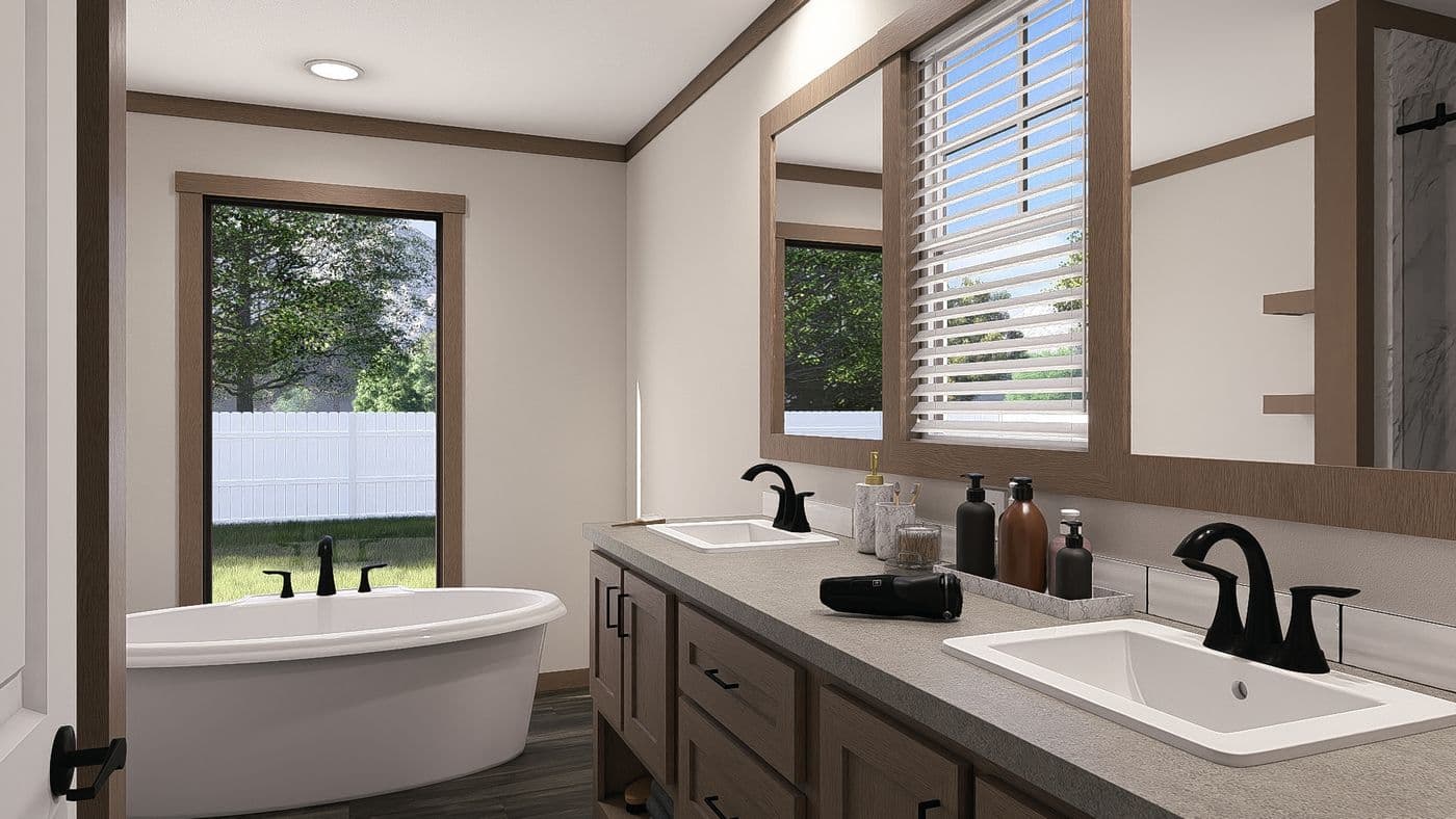The EMILIE Primary Bathroom. This Manufactured Mobile Home features 3 bedrooms and 2 baths.