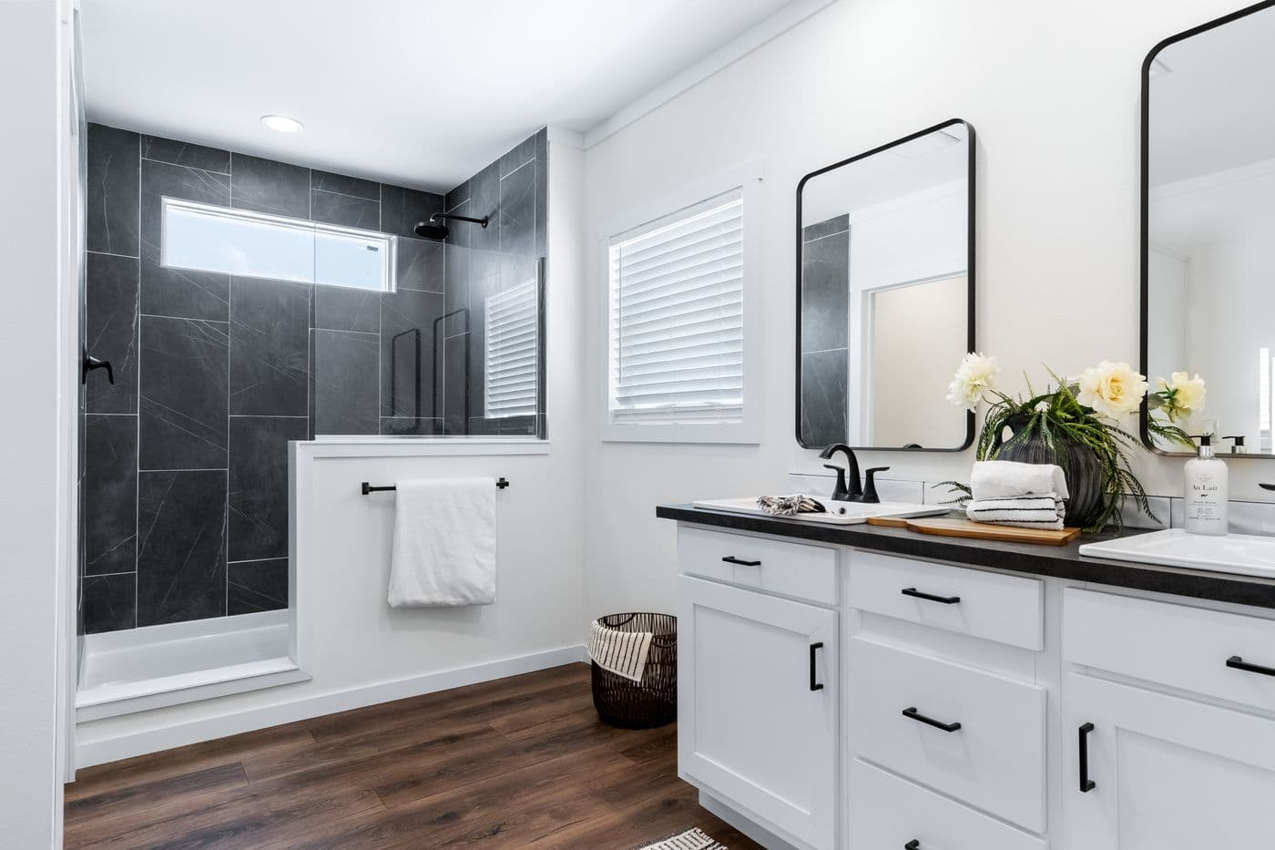 The THE IRON PEAK Primary Bathroom. This Manufactured Mobile Home features 4 bedrooms and 2 baths.