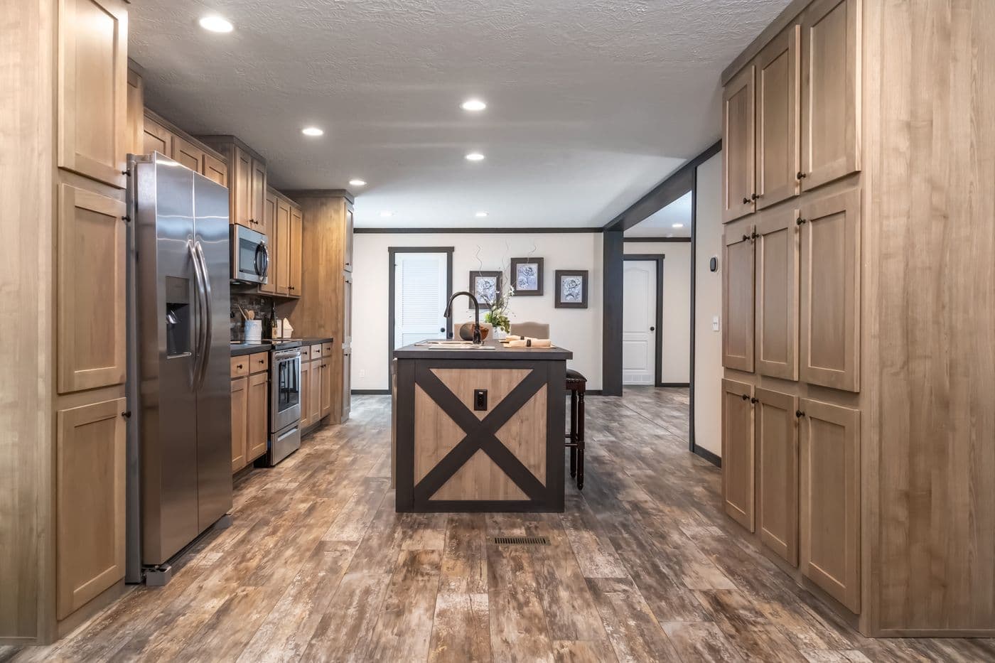 The BOUJEE 2 Kitchen. This Manufactured Mobile Home features 3 bedrooms and 2 baths.