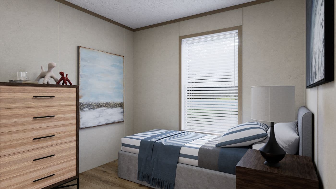 The 5624-CC56 GUARDIAN 56 Guest Bedroom. This Manufactured Mobile Home features 3 bedrooms and 2 baths.