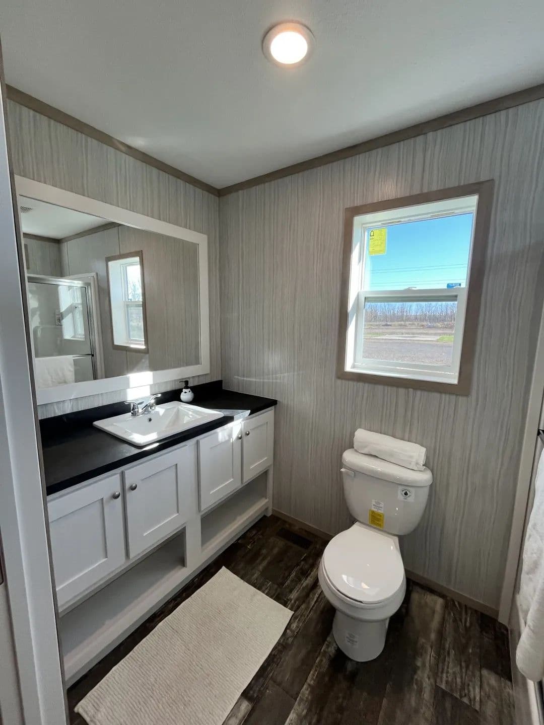 The SAPPHIRE Guest Bathroom. This Manufactured Mobile Home features 3 bedrooms and 2 baths.