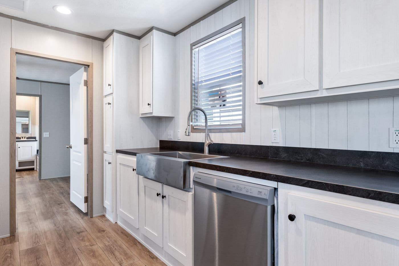 The RESOLUTION 16763K Kitchen. This Manufactured Mobile Home features 3 bedrooms and 2 baths.