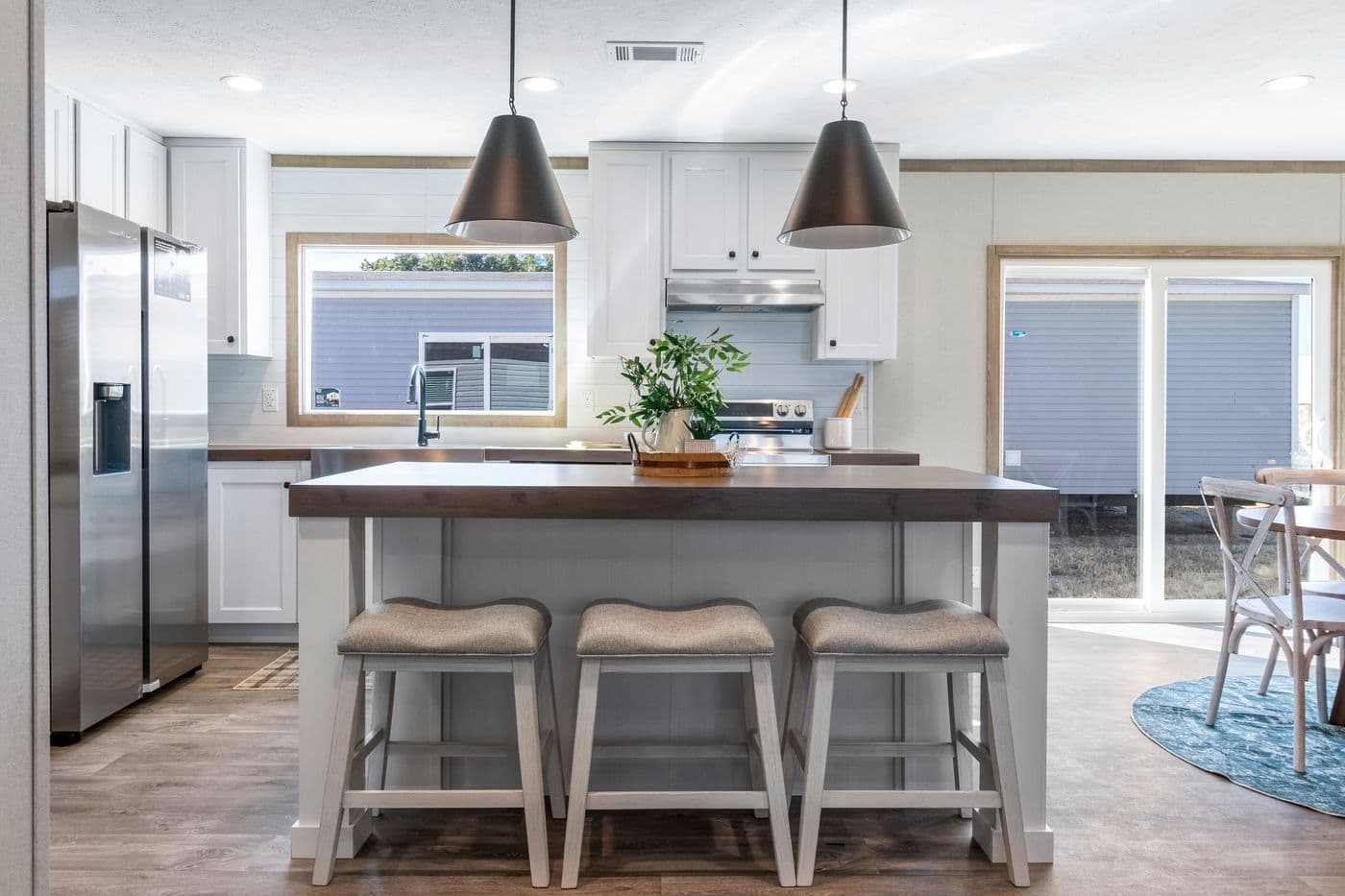The THE BIG DEAL 52 Kitchen. This Manufactured Mobile Home features 3 bedrooms and 2 baths.