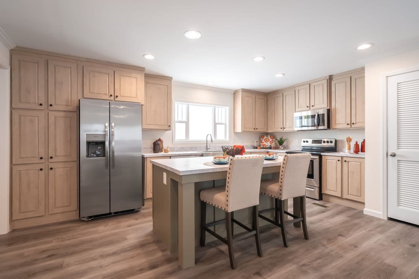 The 4220 "ATLANTIC" 7228 Kitchen. This Manufactured Mobile Home features 3 bedrooms and 2 baths.
