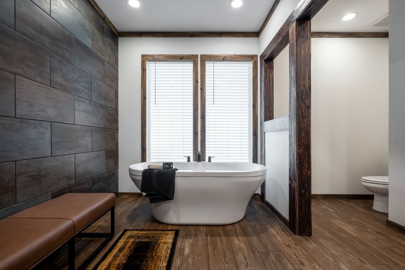 The THE MILL HOUSE Primary Bathroom. This Manufactured Mobile Home features 3 bedrooms and 2 baths.