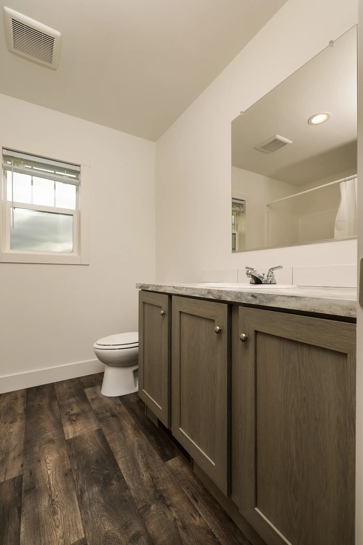 The RAMSEY 223 Guest Bathroom. This Manufactured Mobile Home features 3 bedrooms and 2 baths.