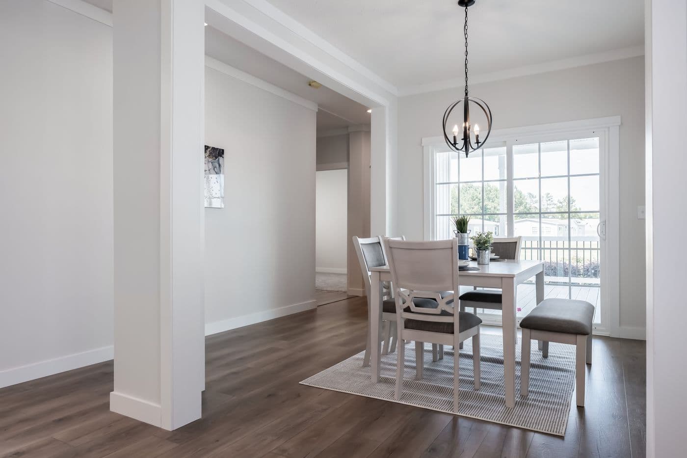 The 3459 MOD 64X28 CAROLINA Dining Room. This Modular Home features 3 bedrooms and 2 baths.