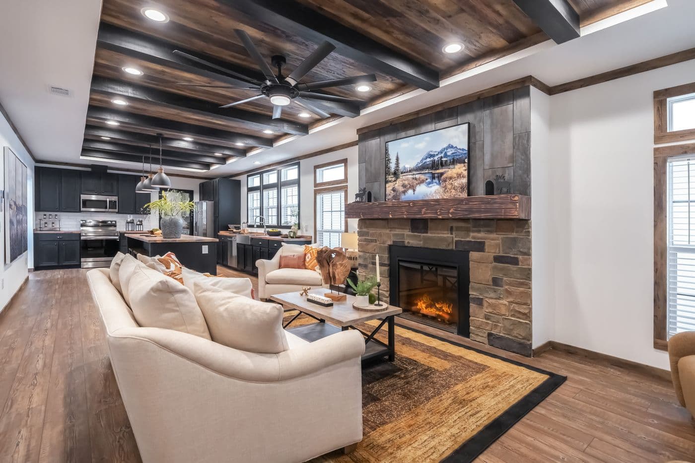 The THE MILL HOUSE Living Room. This Manufactured Mobile Home features 3 bedrooms and 2 baths.
