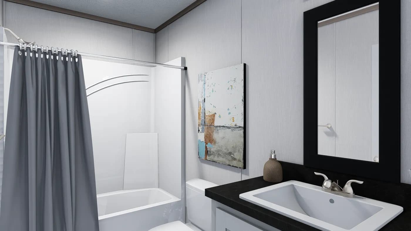 The 5628-E845P THE PULSE Guest Bathroom. This Manufactured Mobile Home features 3 bedrooms and 2 baths.