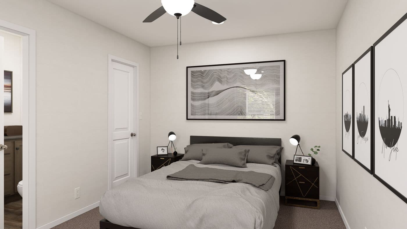 The DRM661N 1566'            DREAM Primary Bedroom. This Manufactured Mobile Home features 3 bedrooms and 2 baths.