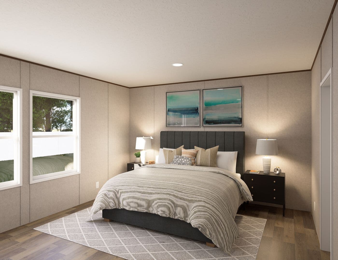 The SYCAMORE Primary Bedroom. This Manufactured Mobile Home features 4 bedrooms and 2 baths.