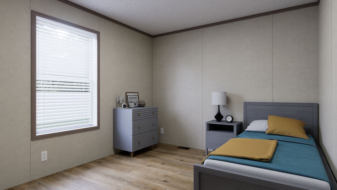 The 5228-CC51 PILLAR 52 Guest Bedroom. This Manufactured Mobile Home features 3 bedrooms and 2 baths.