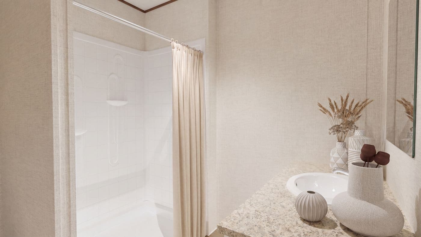 The SYCAMORE Primary Bathroom. This Manufactured Mobile Home features 4 bedrooms and 2 baths.