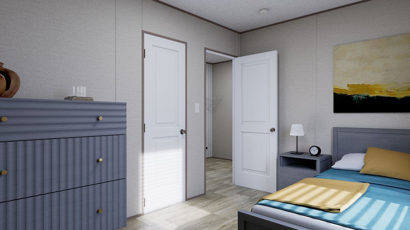 The FOOTHILLS 76 Guest Bedroom. This Manufactured Mobile Home features 3 bedrooms and 2 baths.