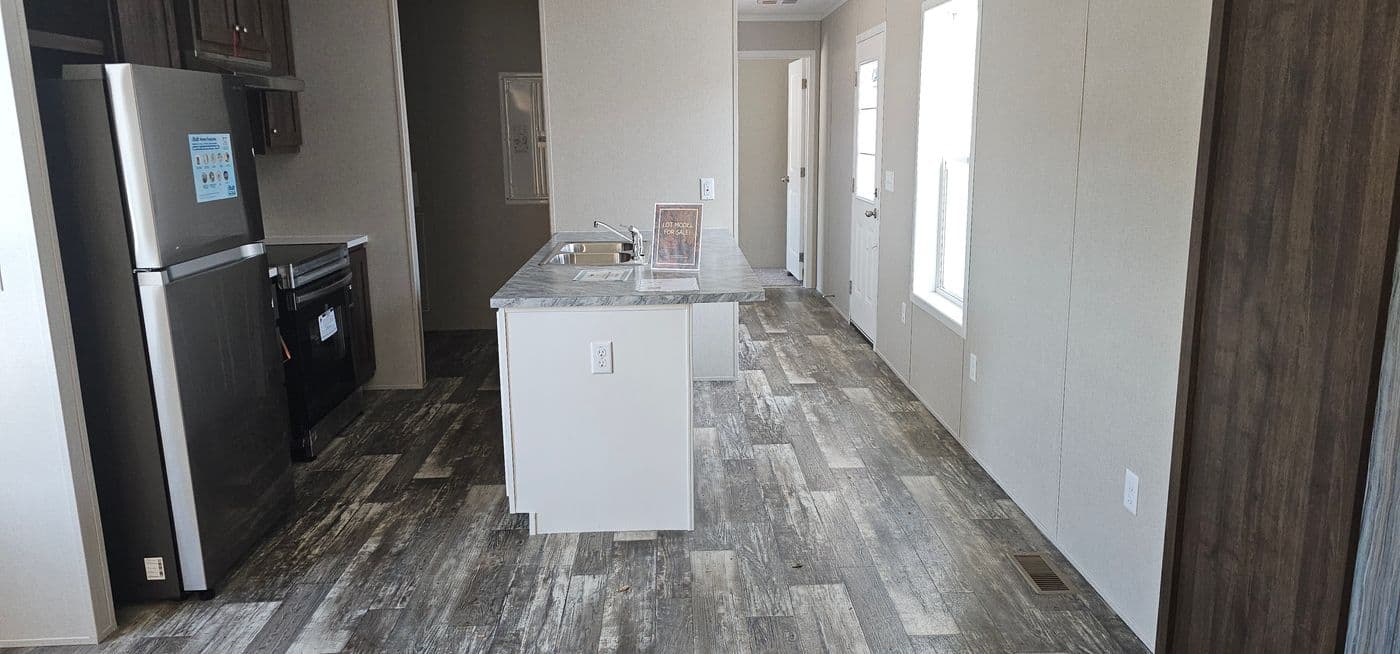 The ONYX 48 Kitchen. This Manufactured Mobile Home features 2 bedrooms and 1 bath.