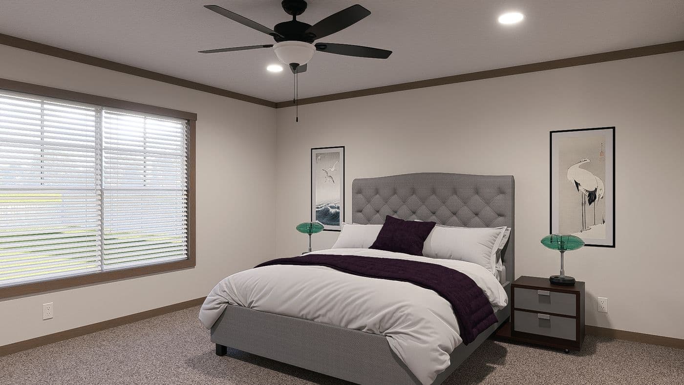 The NELLIE ELITE Primary Bedroom. This Manufactured Mobile Home features 4 bedrooms and 3 baths.