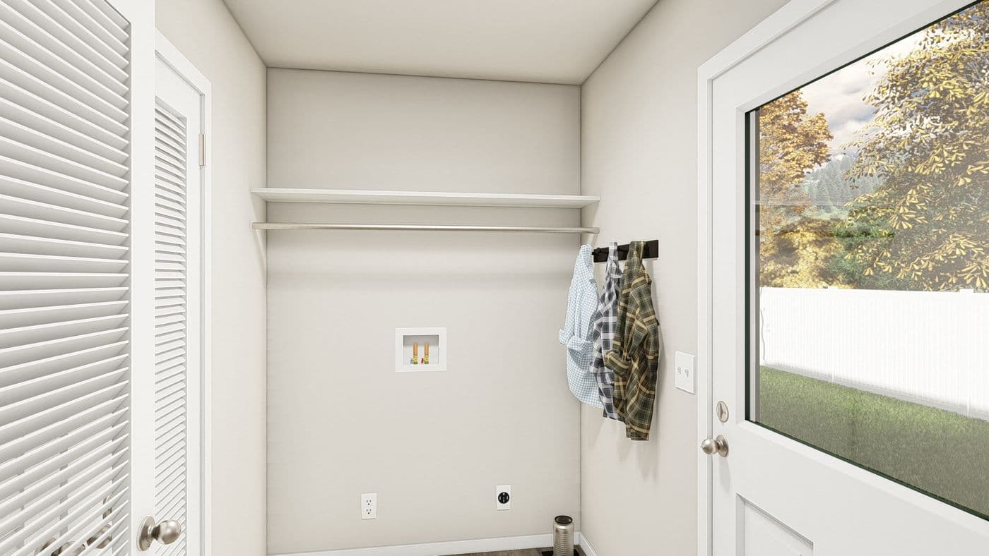 The ING521F NOBLE               GW Utility Room. This Manufactured Mobile Home features 3 bedrooms and 2 baths.