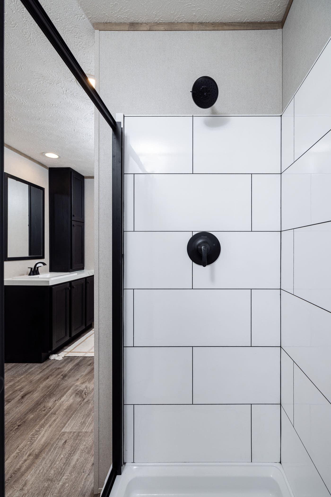 The STERLING ANNIVERSARY Primary Bathroom. This Manufactured Mobile Home features 3 bedrooms and 2 baths.