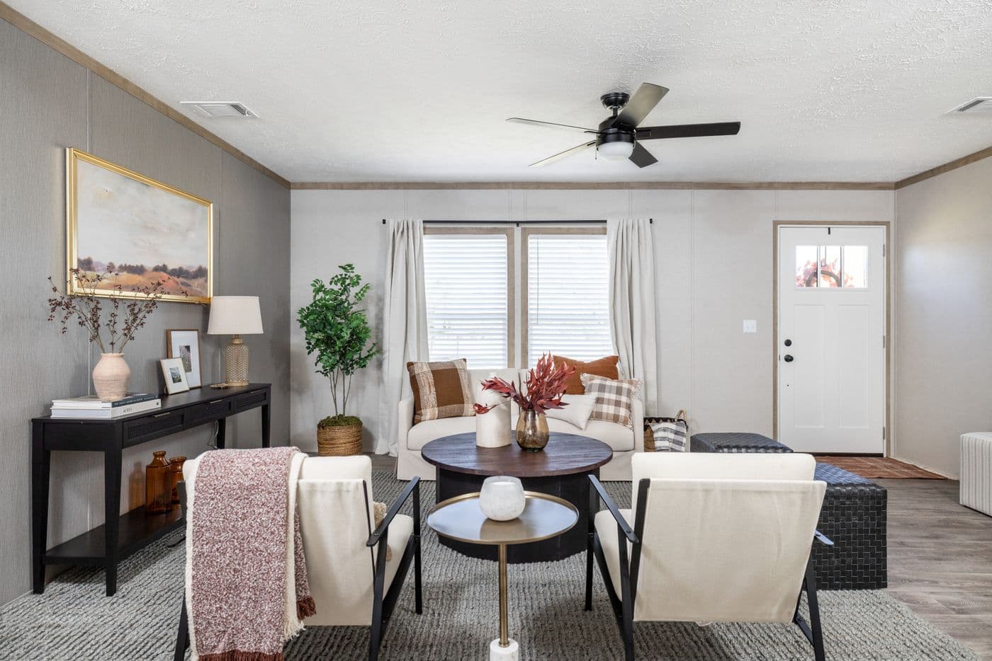 The STERLING ANNIVERSARY Living Room. This Manufactured Mobile Home features 3 bedrooms and 2 baths.