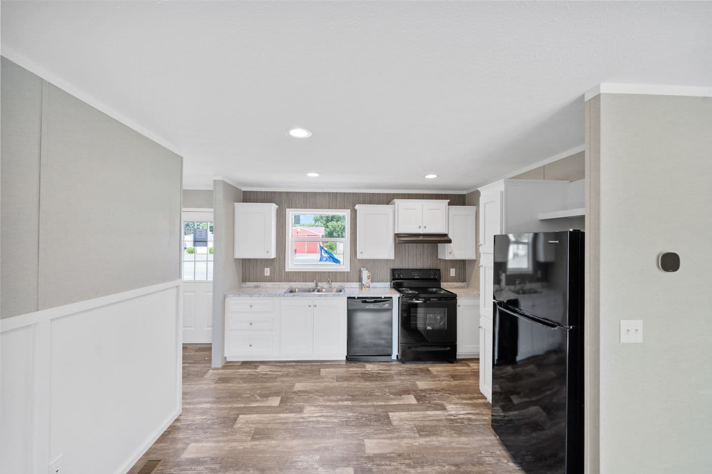 The ZIRCON Dining Area. This Manufactured Mobile Home features 3 bedrooms and 2 baths.
