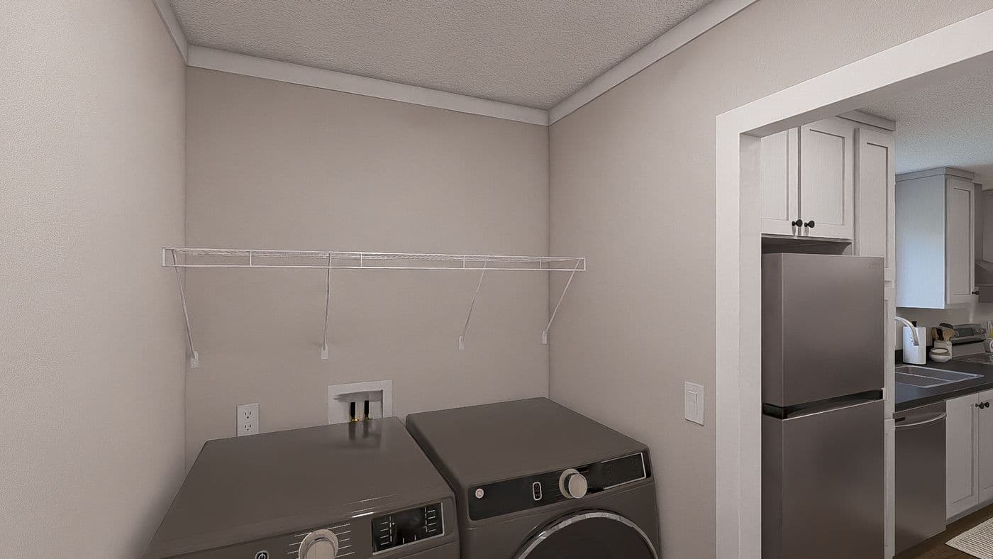 The WONDERFUL WORLD Utility Room. This Manufactured Mobile Home features 3 bedrooms and 2 baths.
