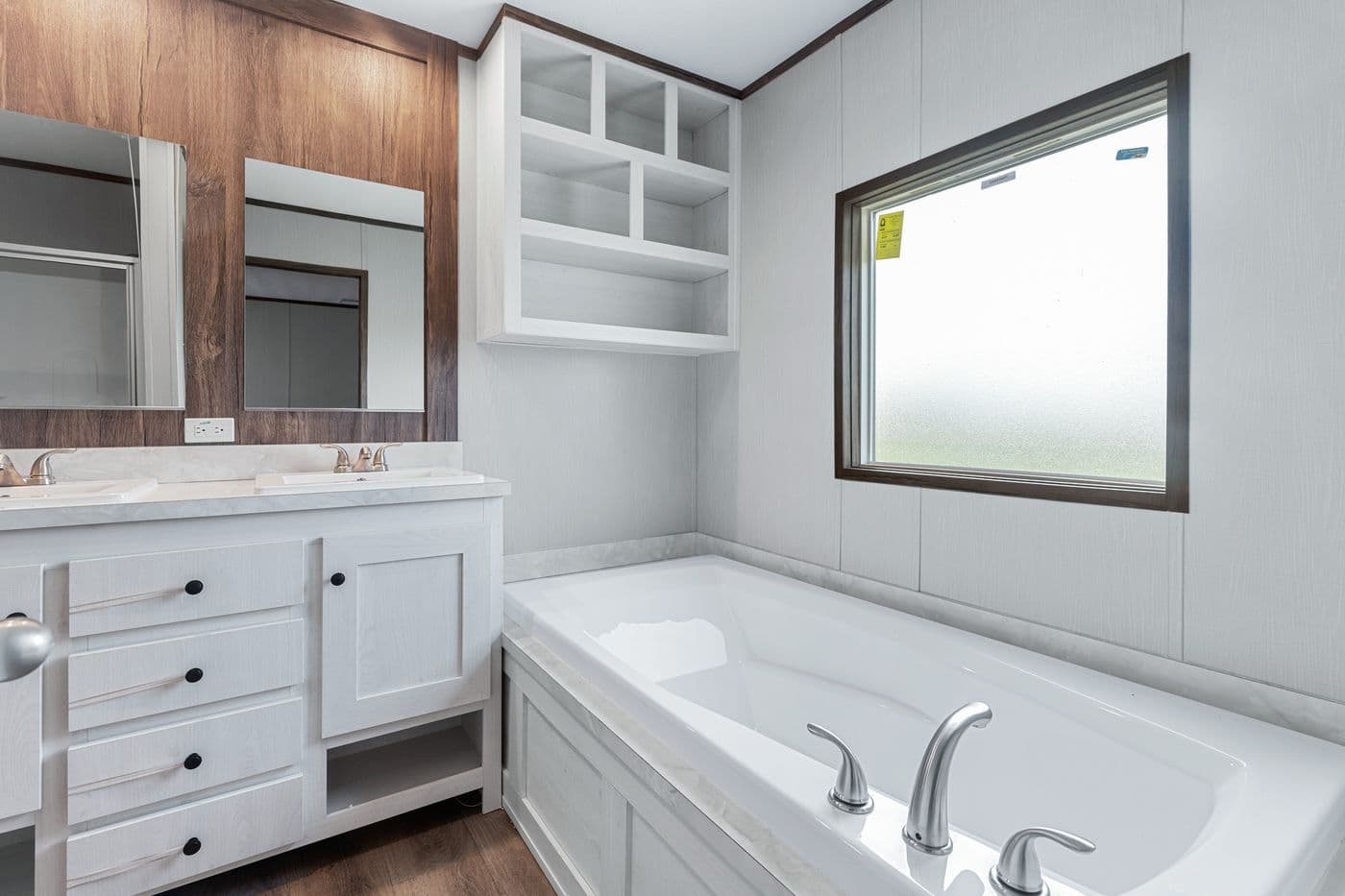 The ANNIVERSARY 16683B Primary Bathroom. This Manufactured Mobile Home features 3 bedrooms and 2 baths.