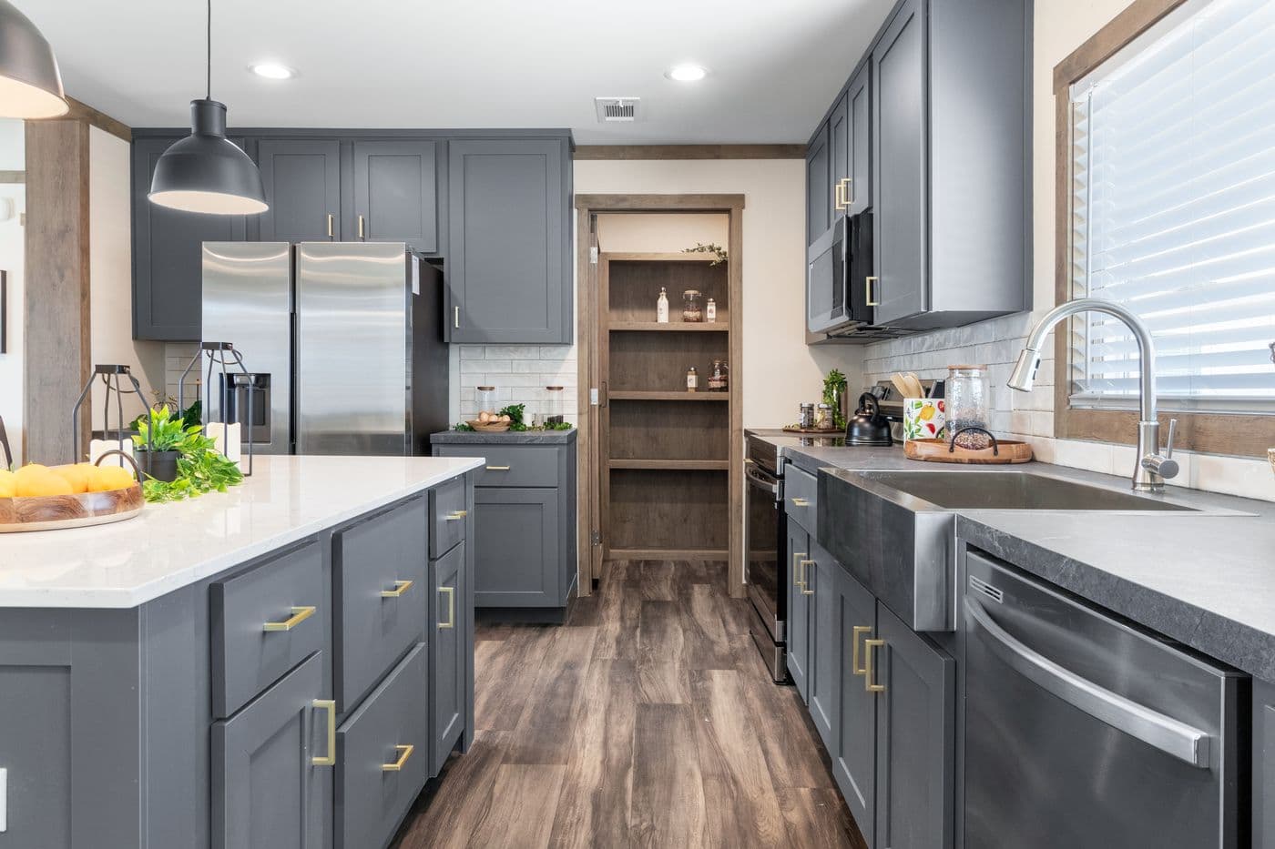The FARM 4 FLEX Kitchen. This Manufactured Mobile Home features 4 bedrooms and 3 baths.