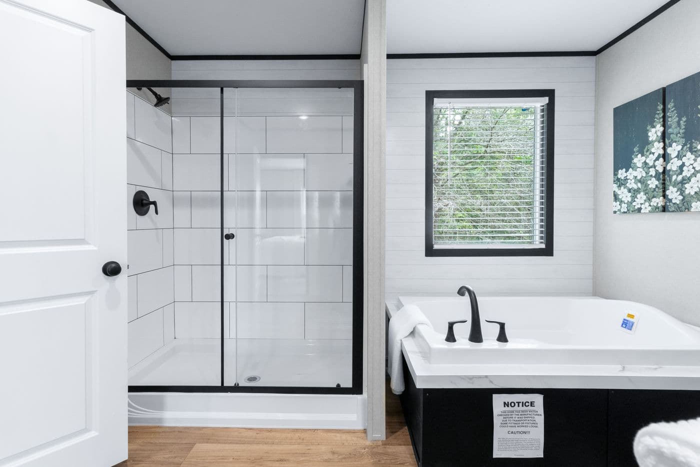 The ABSOLUTE VALUE Primary Bathroom. This Manufactured Mobile Home features 4 bedrooms and 2 baths.