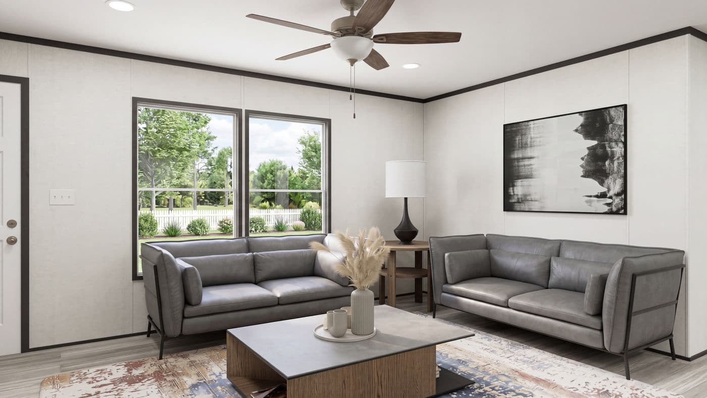 The THE MOUNTAINEER 56 Living Room. This Manufactured Mobile Home features 3 bedrooms and 2 baths.