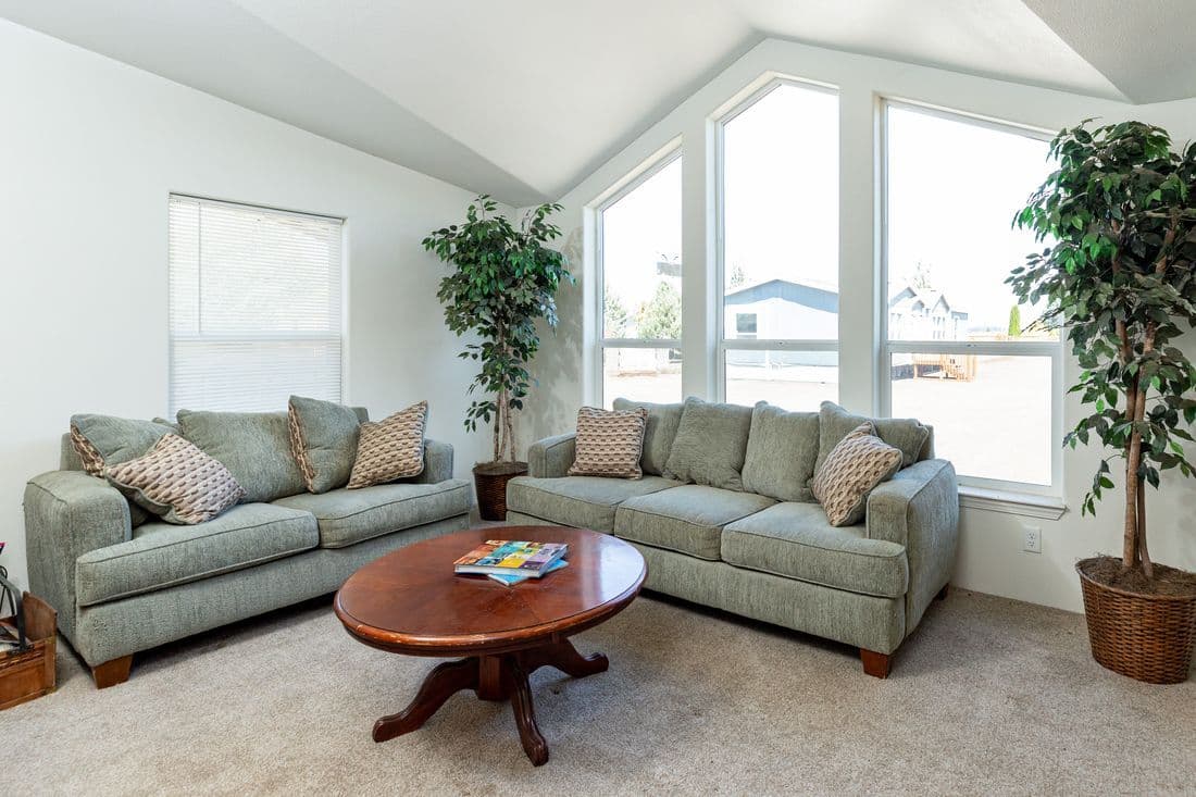 The 2017 COLUMBIA RIVER (NEW) Living Room. This Manufactured Mobile Home features 3 bedrooms and 2 baths.