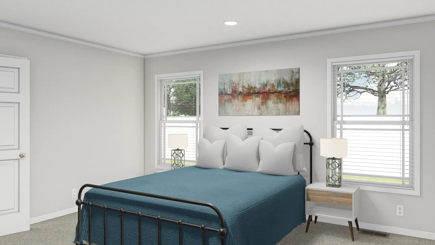 The HAWTHORNE Primary Bedroom. This Manufactured Mobile Home features 3 bedrooms and 2 baths.