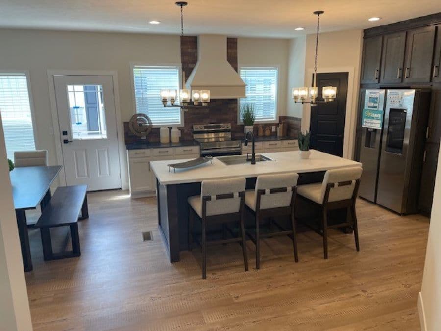 The EDEN/7230-MS061 SECT Kitchen. Island with upgraded Farmhouse sink and Gooseneck faucet.