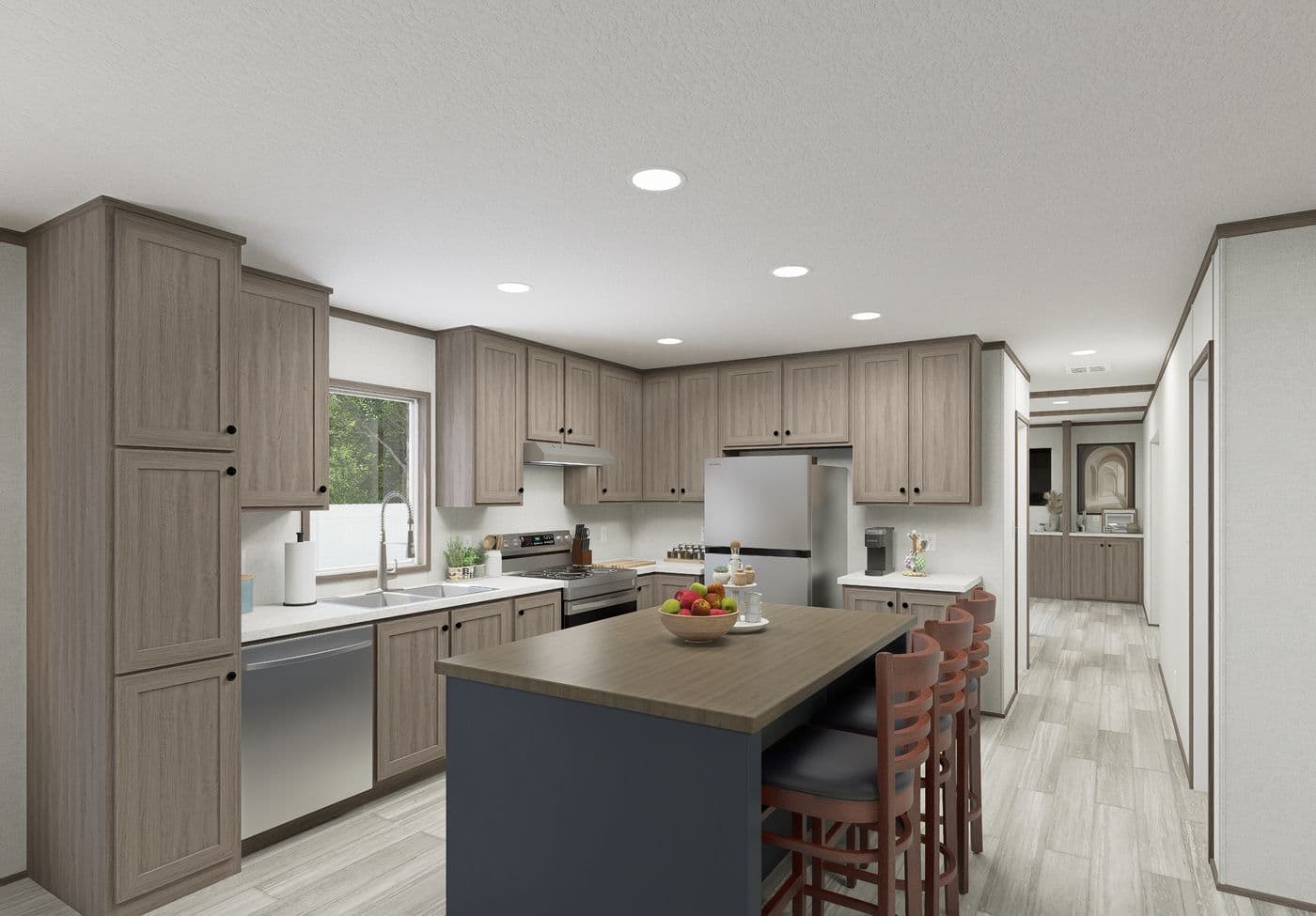 The THE MOUNTAINEER 64 Kitchen. This Manufactured Mobile Home features 3 bedrooms and 2 baths.